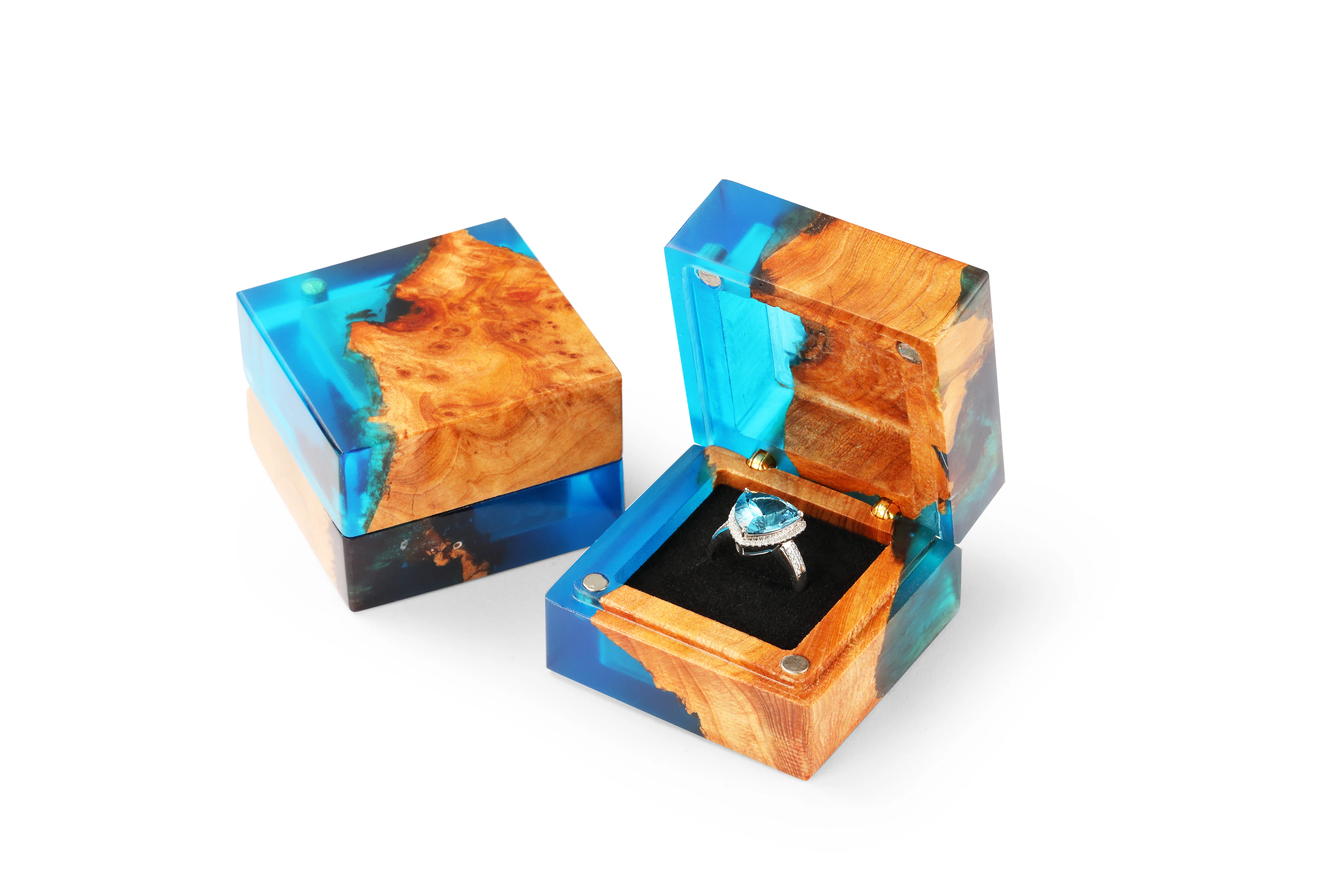 Deep blue wood and resin proposal ring boxes shown open and closed